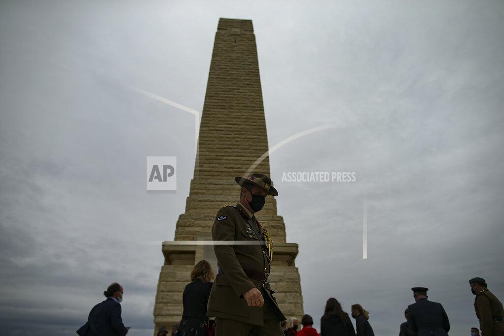 Emrah Gurel Dignitaries and military personnel attend a ceremony to commemorate soldiers who died during the World War I campaign on the Gallipoli peninsula, in Canakkale, Turkey, Saturday, April 24, 2021, a day ahead of the 106th anniversary of the Gallipoli Campaign.The Gallipoli Campaign of 1915 by Allied forces aimed to take control of the peninsula to weaken the Ottoman Empire. The campaign failed and Allied forces withdrew after eight months of fighting on the ground and some 250,000 casualties on both sides. The memorials were kept small due to the COVID-19 pandemic.(AP Photo/Emrah Gurel)