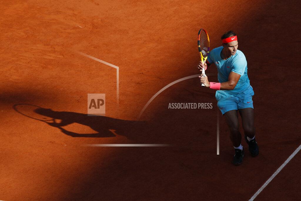 Alessandra Tarantino Spain's Rafael Nadal plays a shot against Argentina's Diego Schwartzman in the semifinal match of the French Open tennis tournament at the Roland Garros stadium in Paris, France, Friday, Oct. 9, 2020. (AP Photo/Alessandra Tarantino)
