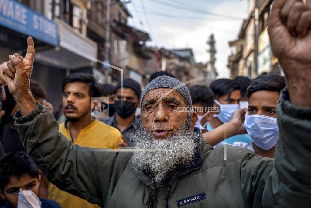 Dar Yasin An elderly man shouts slogans during a protest against sentencing of Kashmiri separatist leader Yasin Malik, in Srinagar, Indian controlled Kashmir, Wednesday, May 25, 2022. An Indian court sentenced a Kashmiri separatist leader to life in prison on Wednesday after finding him guilty of terrorism and sedition, triggering a clash between protesters and police and a partial shutdown of businesses in the Indian-controlled portion of disputed Kashmir. (AP Photo/Dar Yasin)
