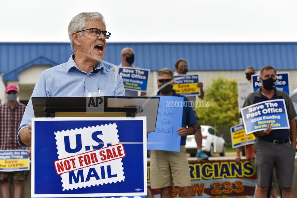 Thom Bridge FILE - In this Aug. 25, 2020, file photo, Democratic Lt. Gov. Mike Cooney, who is running for governor, speaks at a rally in Helena, Mont. Cooney faces U.S. Rep. Greg Gianforte in Tuesday's election on Nov. 3. (Thom Bridge/Independent Record via AP, File)
