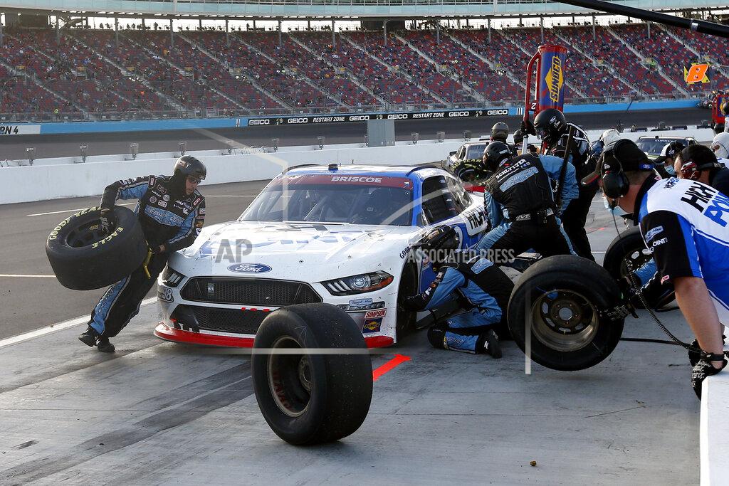 Ralph Freso Chase Briscoe (98) makes a pit stop for tires and gas during a NASCAR Xfinity Series auto race at Phoenix Raceway, Saturday, Nov. 7, 2020, in Avondale, Ariz. (AP Photo/Ralph Freso)