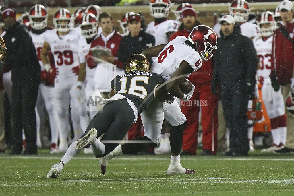 Stacy Bengs Minnesota's defensive back Coney Durr tries to tackle Indiana wide receiver Donavan Hale during an NCAA college football game Friday, Oct. 26, 2018, in Minneapolis. Minnesota won 38-31. (AP Photo/Stacy Bengs)