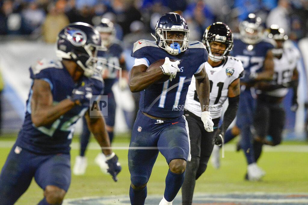 Mark Zaleski Tennessee Titans wide receiver A.J. Brown (11) scores a touchdown on a 65-yard pass reception against the Jacksonville Jaguars in the second half of an NFL football game Sunday, Nov. 24, 2019, in Nashville, Tenn. (AP Photo/Mark Zaleski)