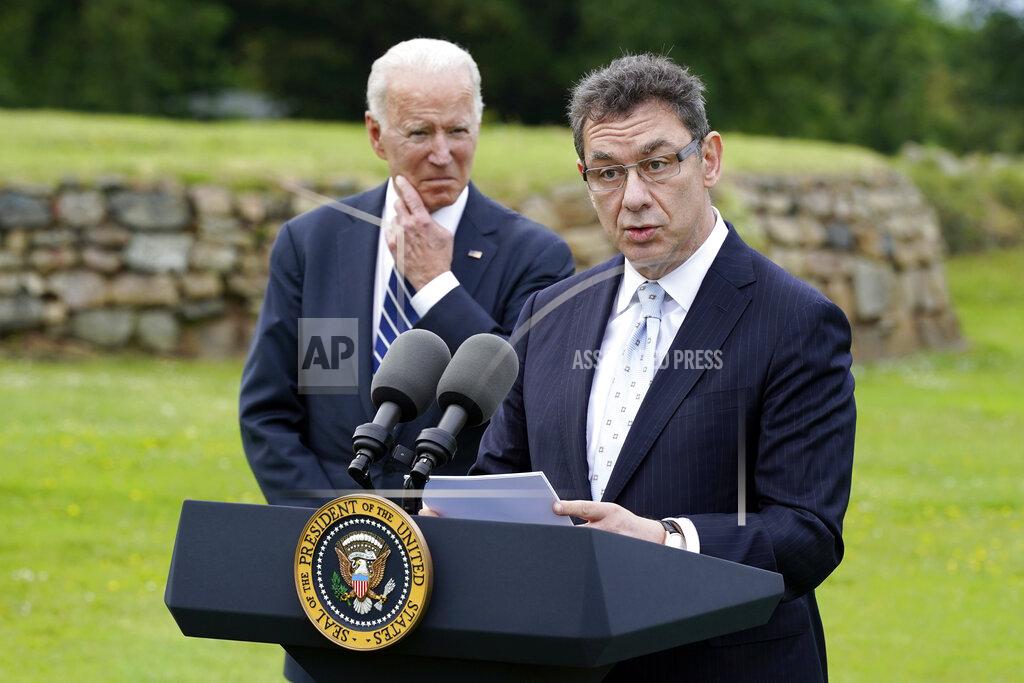 Patrick Semansky President Joe Biden listens as Pfizer CEO Albert Bourla speaks Thursday, June 10, 2021, in St. Ives, England. Biden spoke about his administration's global COVID-19 vaccination efforts ahead of the G-7 summit. (AP Photo/Patrick Semansky)
