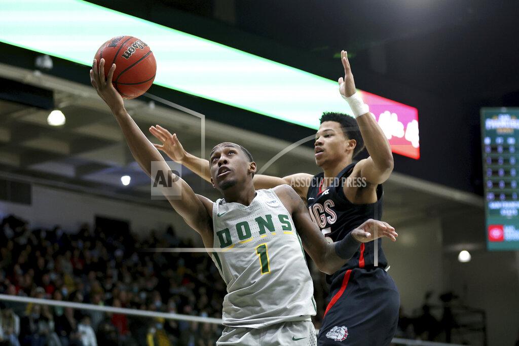 Jed Jacobsohn San Francisco guard Jamaree Bouyea (1) shoots against Gonzaga guard Rasir Bolton, right, during the first half of an NCAA college basketball game in San Francisco, Calif., Thursday, Feb. 24, 2022. (AP Photo/Jed Jacobsohn)