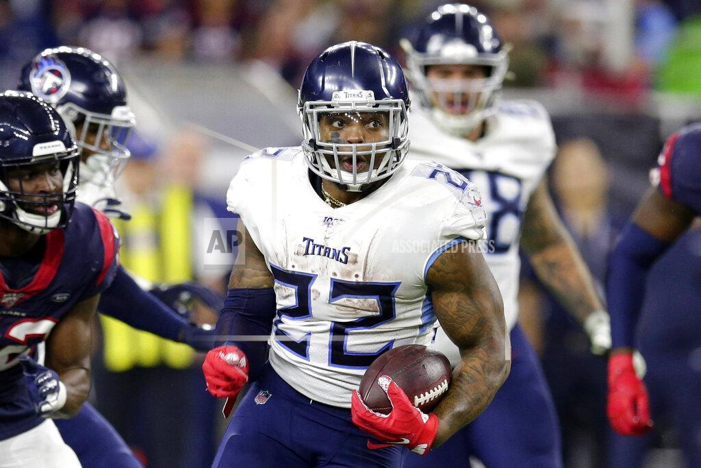 Michael Wyke FILE - In this Dec. 29, 2019, file photo, Tennessee Titans running back Derrick Henry (22) breaks away for a 53-yard touchdown run during the second half of an NFL football game, in Houston. The top-seeded Baltimore Ravens (14-2) bring a 12-game winning streak and the most productive offense in the NFL into Saturday's AFC playoff game against the Titans (10-7), who advanced by beating New England 20-13 last week. (AP Photo/Michael Wyke, File)
