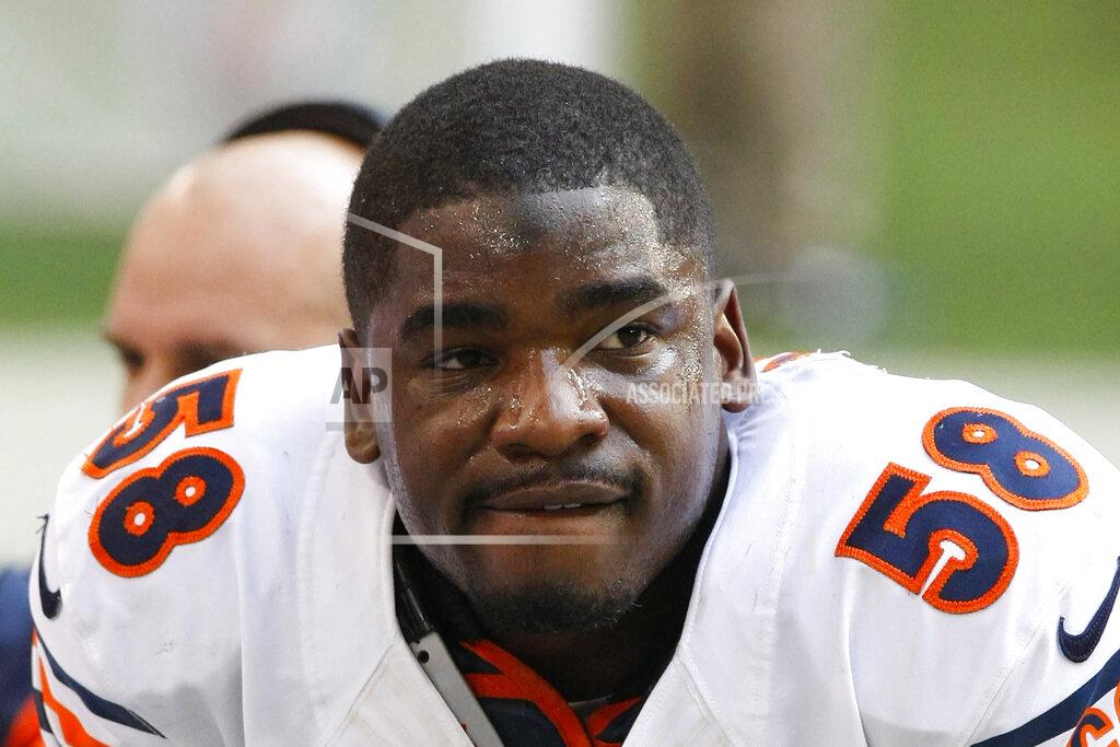 FILE - Chicago Bears outside linebacker Geno Hayes (58) watches from the sidelines during the first half of an NFL football game against the Arizona Cardinals in Glendale, Ariz., in this Sunday, Dec. 23, 2012, file photo. Hayes, a former NFL linebacker who starred at Florida State, has died. He was 33. The Tampa Bay Buccaneers on Tuesday, April 27, 2021, confirmed his death. He had liver disease and had been in hospice care. (AP Photo/Rick Scuteri, File)