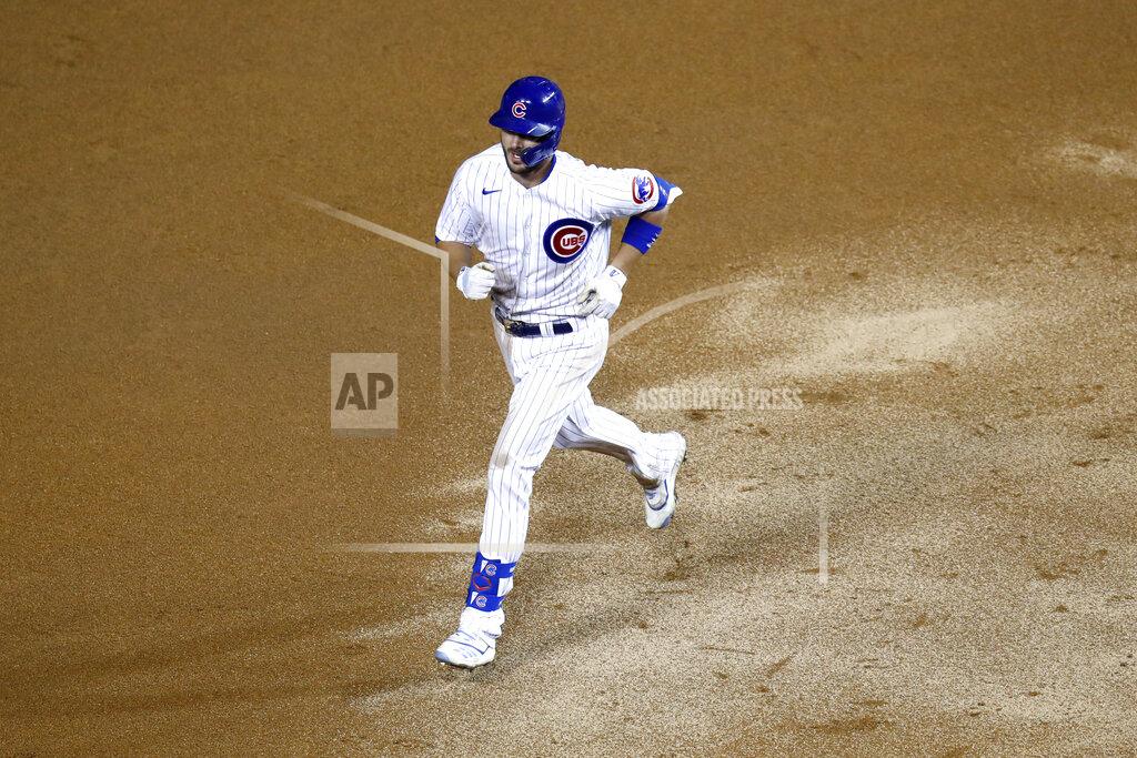 Charles Rex Arbogast Chicago Cubs' Kris Bryant rounds the bases after hitting a home run during the seventh inning of a baseball game against the Kansas City Royals Monday, Aug. 3, 2020, in Chicago. (AP Photo/Charles Rex Arbogast)