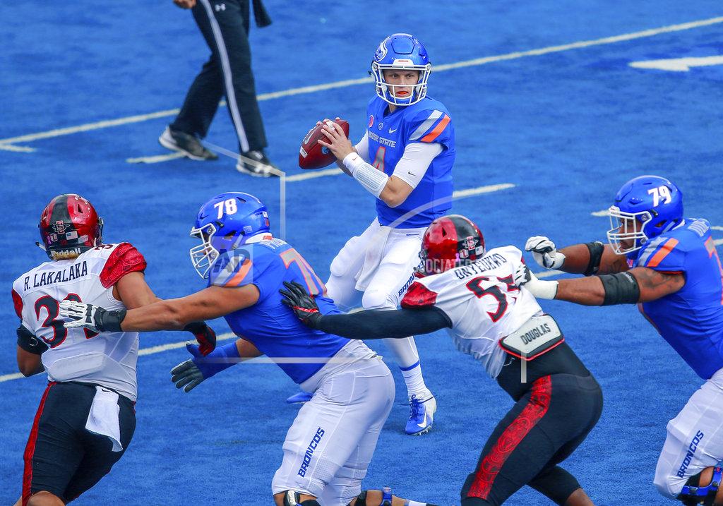 Steve Conner Boise State quarterback Brett Rypien (4) looks down field as he comes under pressure from the San Diego State defense in the first half of an NCAA college football game, Saturday, Oct. 6, 2018, in Boise, Idaho. (AP Photo/Steve Conner)