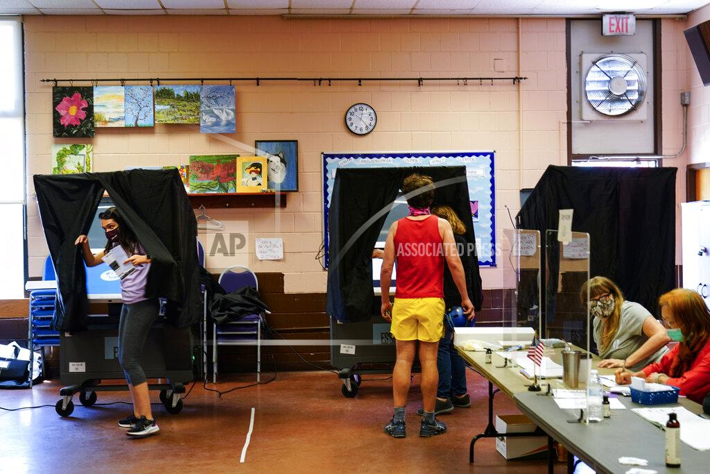 Matt Rourke A voter steps from the voting booth after casting a ballot in the Pennsylvania primary in Philadelphia, Tuesday, May 18, 2021. (AP Photo/Matt Rourke)