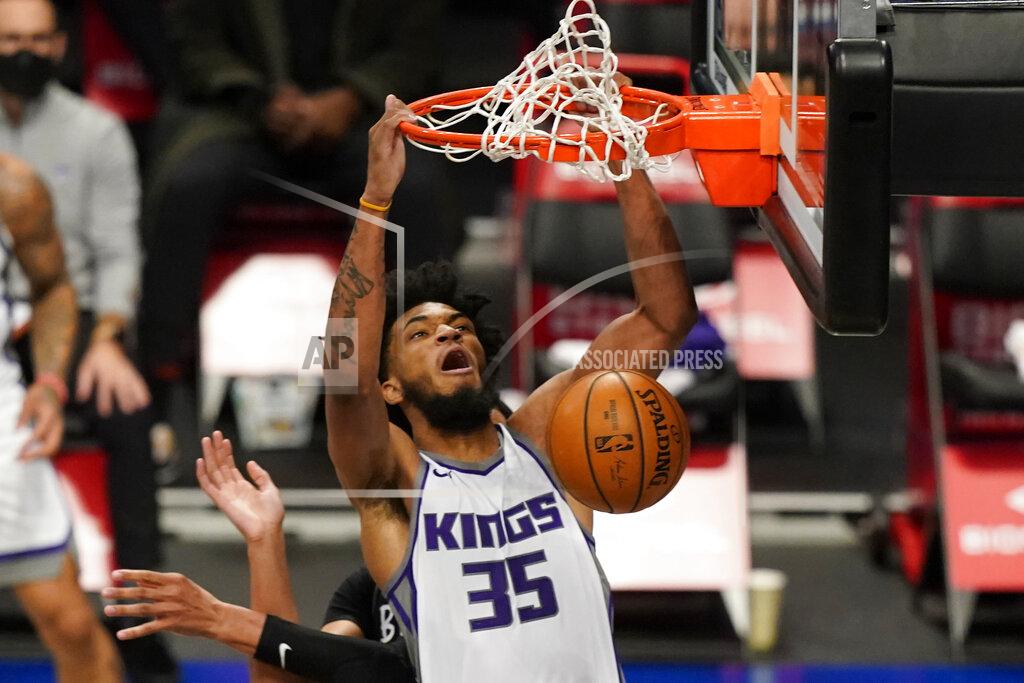 Kathy Willens Sacramento Kings forward Marvin Bagley III (35) dunks during the first quarter of an NBA basketball game against the Brooklyn Nets, Tuesday, Feb. 23, 2021, in New York. (AP Photo/Kathy Willens)