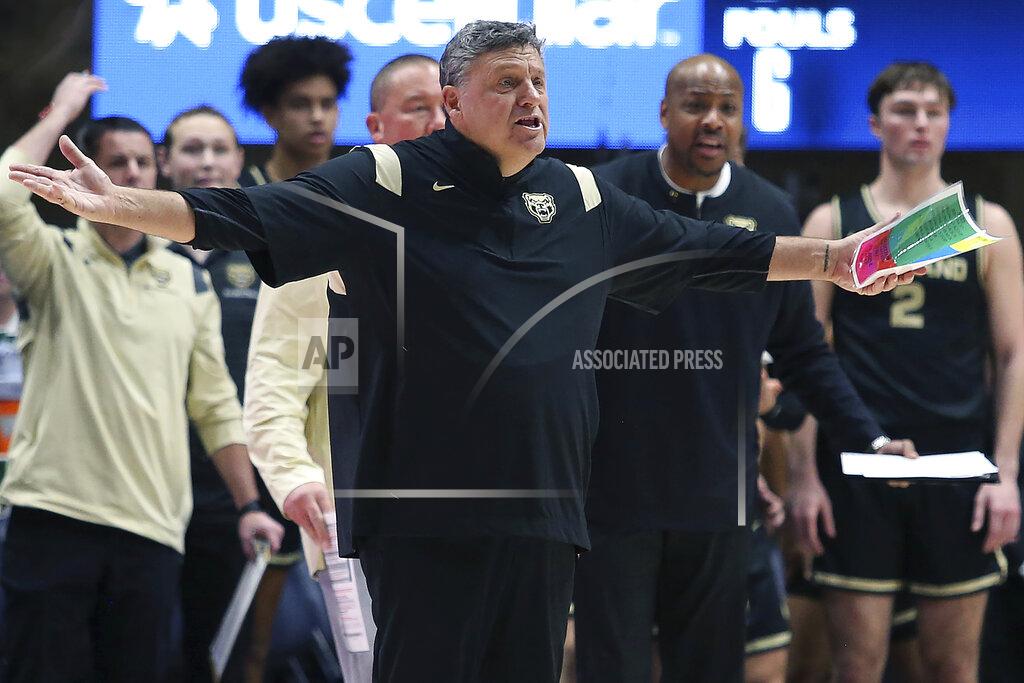 Kathleen Batten Oakland coach Greg Kampe reacts during the first half of an NCAA college basketball game against West Virginia in Morgantown, W.Va., Tuesday, Nov. 9, 2021. (AP Photo/Kathleen Batten)