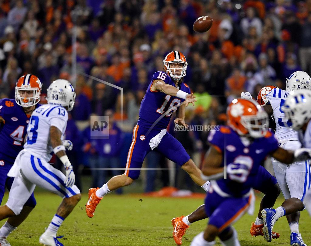 Richard Shiro Clemson quarterback Trevor Lawrence throws a pass under pressure during the first half of an NCAA college football game against Duke on Saturday, Nov. 17, 2018, in Clemson, S.C. (AP Photo/Richard Shiro)
