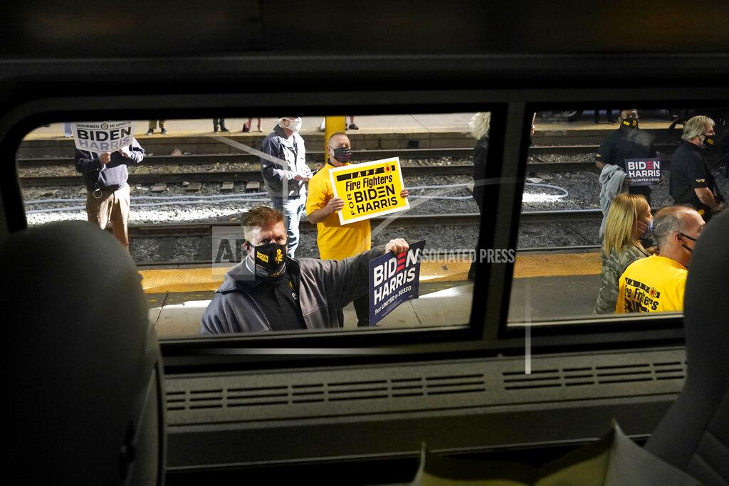 Andrew Harnik Supporters welcome Democratic presidential candidate former Vice President Joe Biden to Amtrak's Pittsburgh Train Station, Wednesday, Sept. 30, 2020, in Pittsburgh. Biden is on a train tour through Ohio and Pennsylvania today. (AP Photo/Andrew Harnik)