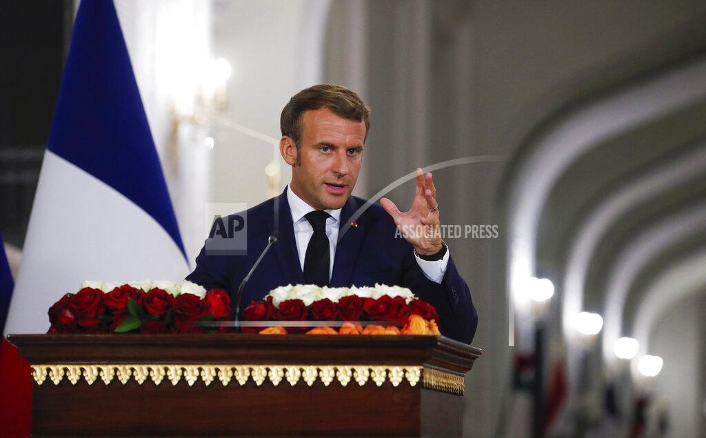 Gonzalo Fuentes French President Emmanuel Macron speaks during a joint press conference with Iraqi President Barham Salih, at the Salam Palace Wednesday, Sept. 2, 2020 in Baghdad. French President Emmanuel Macron is the first head of state to visit the Iraqi capital since Prime Minister Mustafa al-Kadhimi, Iraq's former intelligence chief, formed a new government in May. (Gonzalo Fuentes/Pool via AP)