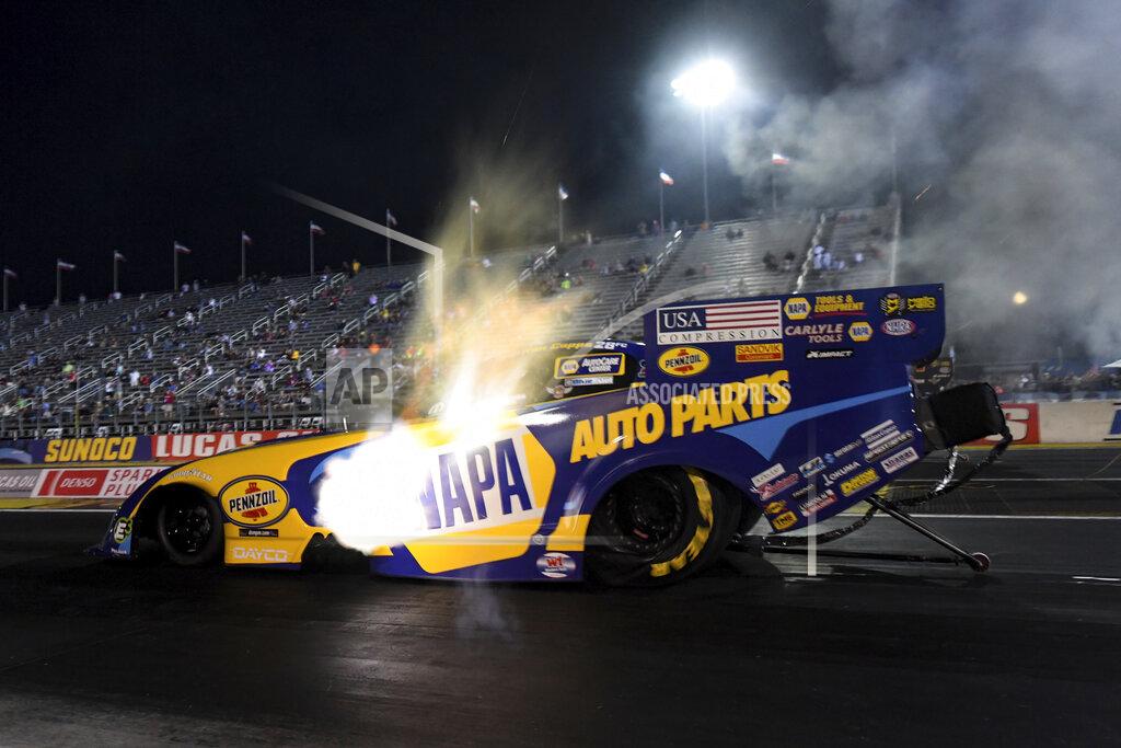 Marc Gewertz In this photo provided by the NHRA, Ron Capps drives in Funny Car qualifying Friday, Sept. 4, 2020, at the NHRA U.S. Nationals drag races in Brownsburg, Ind. (Marc Gewertz/NHRA via AP)