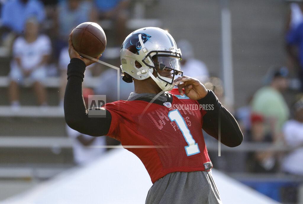 Chuck Burton Carolina Panthers quarterback Cam Newton looks to pass during practice at the NFL football team's training camp in Spartanburg, N.C., Thursday, July 25, 2019. (AP Photo/Chuck Burton)