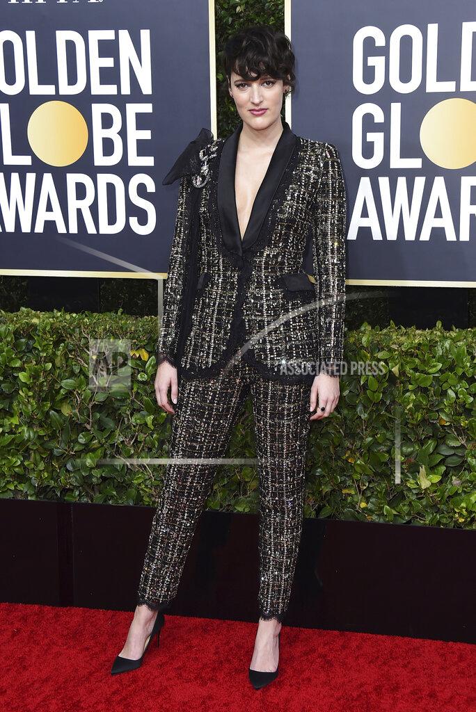 Jordan Strauss FILE - Phoebe Waller-Bridge arrives at the 77th annual Golden Globe Awards on Jan. 5, 2020, in Beverly Hills, Calif. Waller-Bridge is among the entertainers who took the initiative to make the best out of a challenging year. The actor auctioned off her Golden Globe suit for Australia brushfire relief. (Photo by Jordan Strauss/Invision/AP, File)