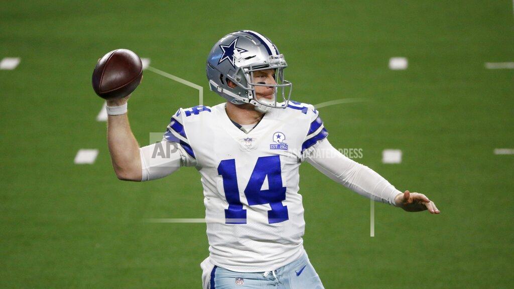 Michael Ainsworth Dallas Cowboys' Andy Dalton (14) throws a pass in the second half of an NFL football game against the Arizona Cardinals in Arlington, Texas, Monday, Oct. 19, 2020. (AP Photo/Michael Ainsworth)