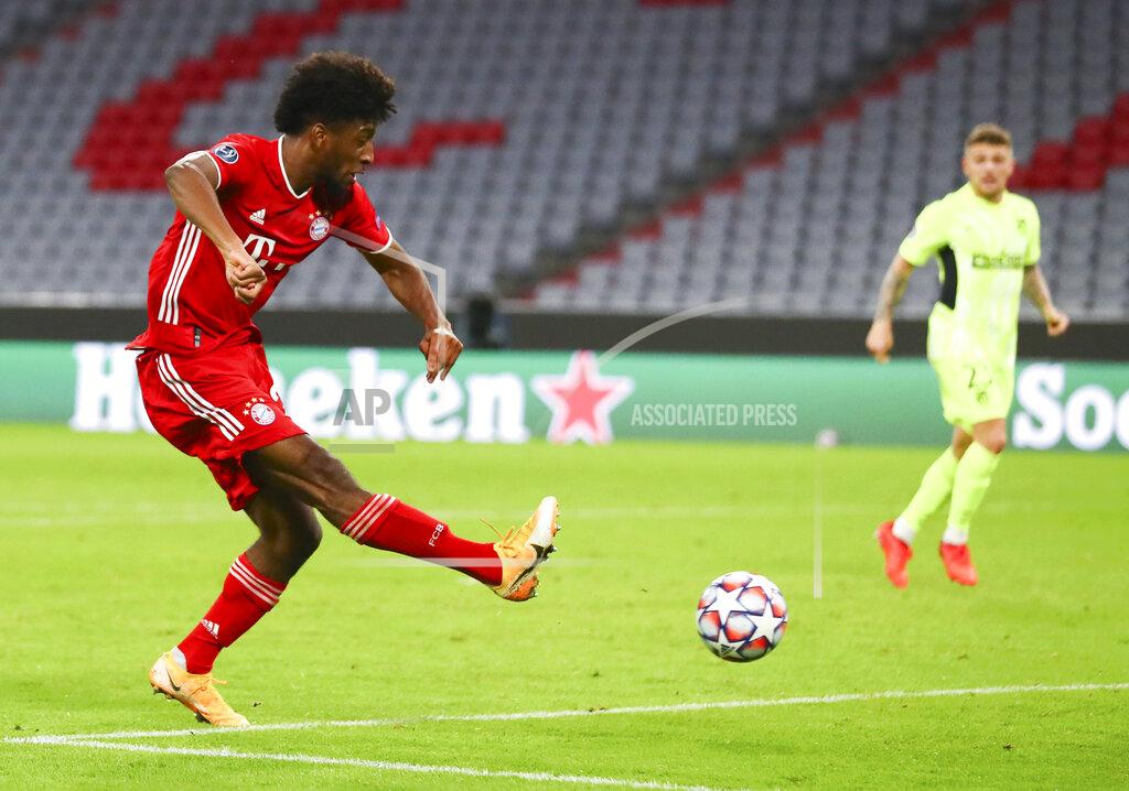 Matthias Schrader Bayern Munich's Kingsley Coman scores his team's fourth goal during the Champions League Group A soccer match between Bayern Munich and Atletico Madrid at the Allianz Arena in Munich, Germany, Wednesday, Oct. 21, 2020. (AP Photo/Matthias Schrader,Pool)