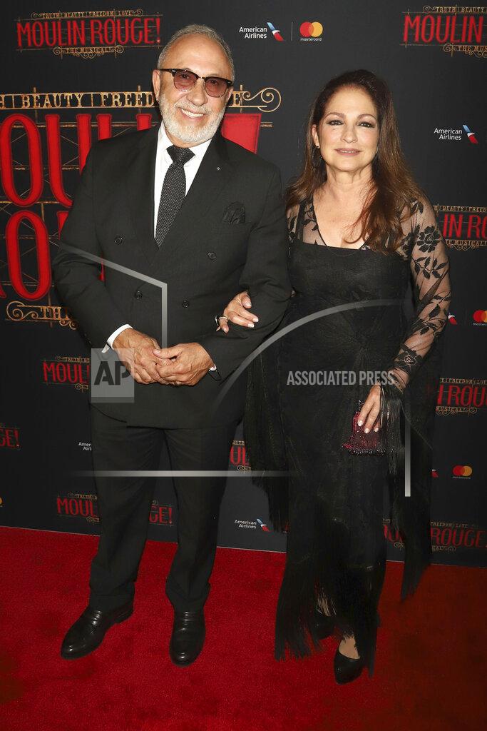 Greg Allen FILE - Emilio Estefan, left, and Gloria Estefan attend the Broadway opening of "Moulin Rouge! The Musical" in New York on July 25, 2019. The couple's restaurant Estefan Kitchen served up homemade meals for health care workers in Miami. (Photo by Greg Allen/Invision/AP, File)