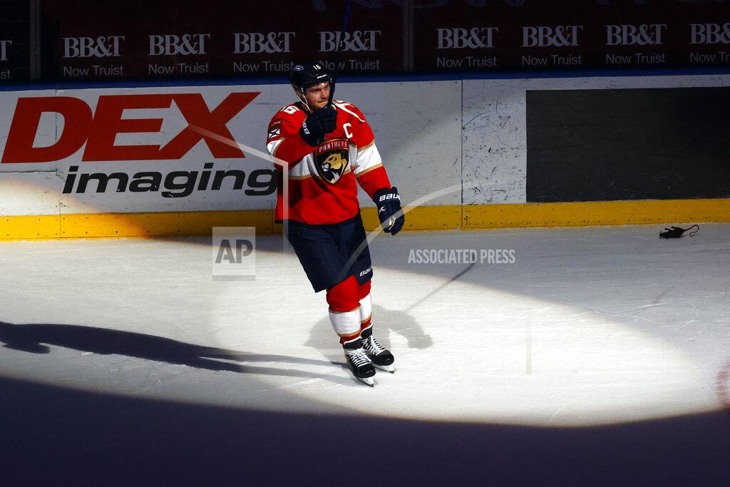 Joel Auerbach Florida Panthers center Aleksander Barkov is awarded the first star of the game after scoring in overtime of the team's NHL hockey game against the Carolina Hurricanes, Saturday, April 24, 2021, in Sunrise, Fla. (AP Photo/Joel Auerbach)