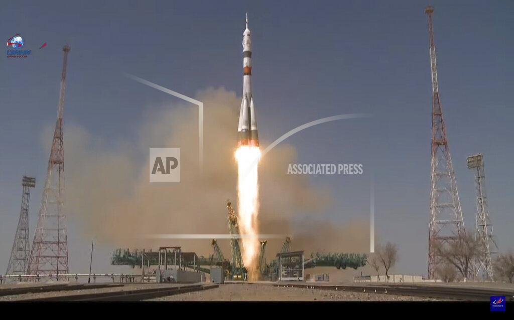 Uncredited In this photo taken from video footage released by the Roscosmos Space Agency, the Soyuz-2.1a rocket booster with Soyuz MS-18 space ship carrying a new crew to the International Space Station, ISS, blasts off at the Russian leased Baikonur cosmodrome, Kazakhstan, Friday, April 9, 2021. A Russian-U.S. trio of space travelers have launched successfully, heading for the International Space Station. NASA astronaut Mark Vande Hei and Russian cosmonauts Oleg Novitskiy and Pyotr Dubrov blasted off as scheduled at 12:42 p.m. (0742 GMT, 3:42 a.m. EDT) Friday aboard the Soyuz MS-18 spacecraft from the Russia-leased Baikonur launch facility in Kazakhstan. (Roscosmos Space Agency via AP)
