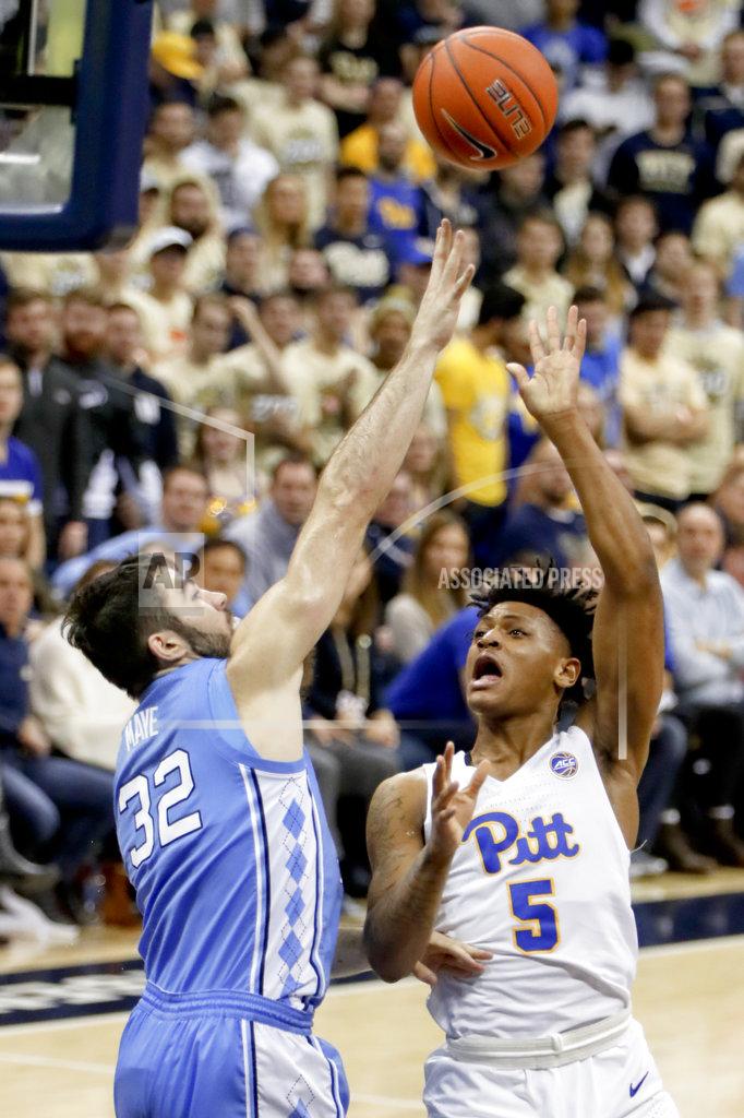 Keith Srakocic Pittsburgh's Au'Diese Toney shoots over North Carolina's Luke Maye (32) during the first half of an NCAA college basketball game, Saturday, Jan. 5, 2019, in Pittsburgh. (AP Photo/Keith Srakocic)