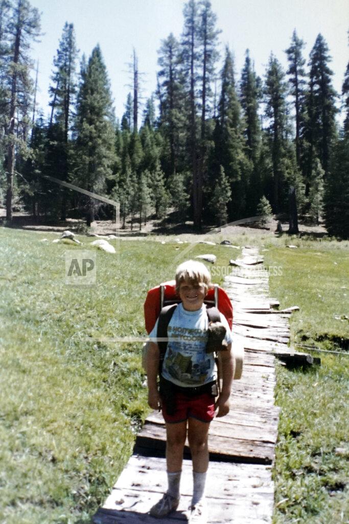 Uncredited In this August 1981 photo provided by Kathleen McIlvain is Charles McIlvain, backpacking in Sequoia National Forest, Calif. Charles McIlvain was one of 34 people killed when the dive boat Conception caught fire and sank off the coast of California on Sept. 2, 2019. (Kathleen McIlvain via AP)