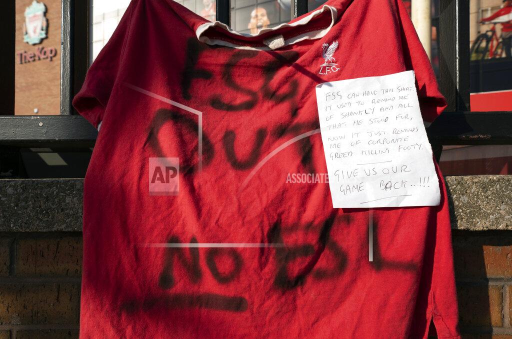 Jon Super A football shirt is seen outside Liverpool's Anfield Stadium protesting the formation of the European Super League, Liverpool, England, Monday, April 19, 2021. Players at the 12 clubs setting up their own Super League could be banned from this year's European Championship and next year's World Cup, UEFA President Aleksander Ceferin said Monday. (AP Photo/Jon Super)