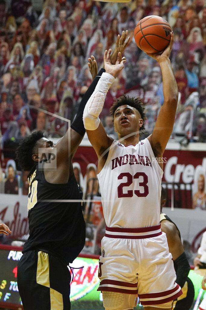 Darron Cummings Indiana's Trayce Jackson-Davis (23) shoots over Purdue's Trevion Williams (50) during the second half of an NCAA college basketball game Thursday, Jan. 14, 2021, in Bloomington, Ind. Purdue won 81-69. (AP Photo/Darron Cummings)