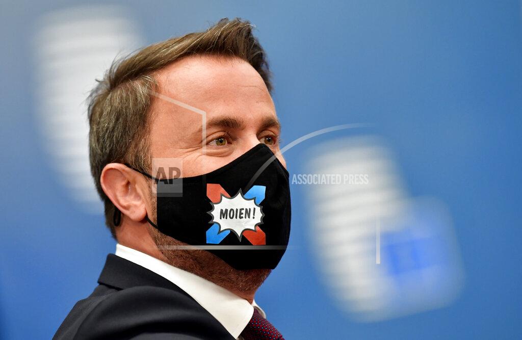 John Thys Luxembourg's Prime Minister Xavier Bettel arrives for an EU summit at the European Council building in Brussels, Friday, July 17, 2020. Leaders from 27 European Union nations meet face-to-face on Friday for the first time since February, despite the dangers of the coronavirus pandemic, to assess an overall budget and recovery package spread over seven years estimated at some 1.75 trillion to 1.85 trillion euros. (John Thys, Pool Photo via AP)