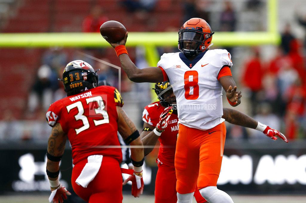 Patrick Semansky Illinois quarterback M.J. Rivers II (8) throws to a receiver as he is pressured by Maryland linebacker Tre Watson (33) in the first half of an NCAA college football game against Maryland, Saturday, Oct. 27, 2018, in College Park, Md. Watson was ejected from the game for targeting Rivers on the play. (AP Photo/Patrick Semansky)