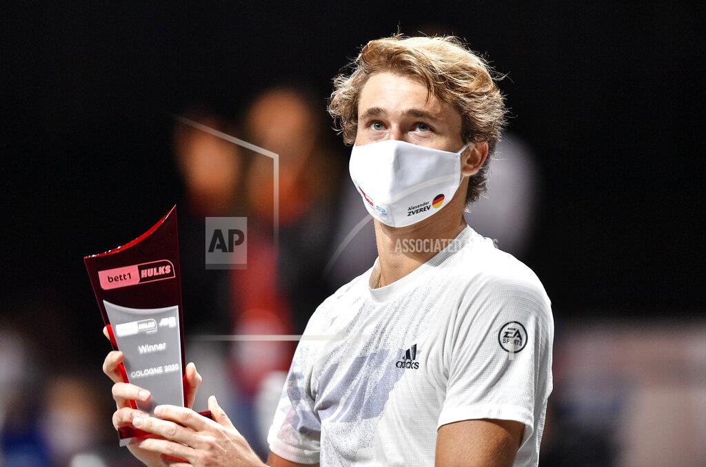 Martin Meissner Germany's Alexander Zverev celebrates with the trophy after winning the ATP bett1HULKS Championship tennis final against Argentina's Diego Schwartzmann in Cologne, Germany, Sunday, Oct. 25, 2020. Zverev defeated Schwartzmann 6-2, 6-1. (AP Photo/Martin Meissner)