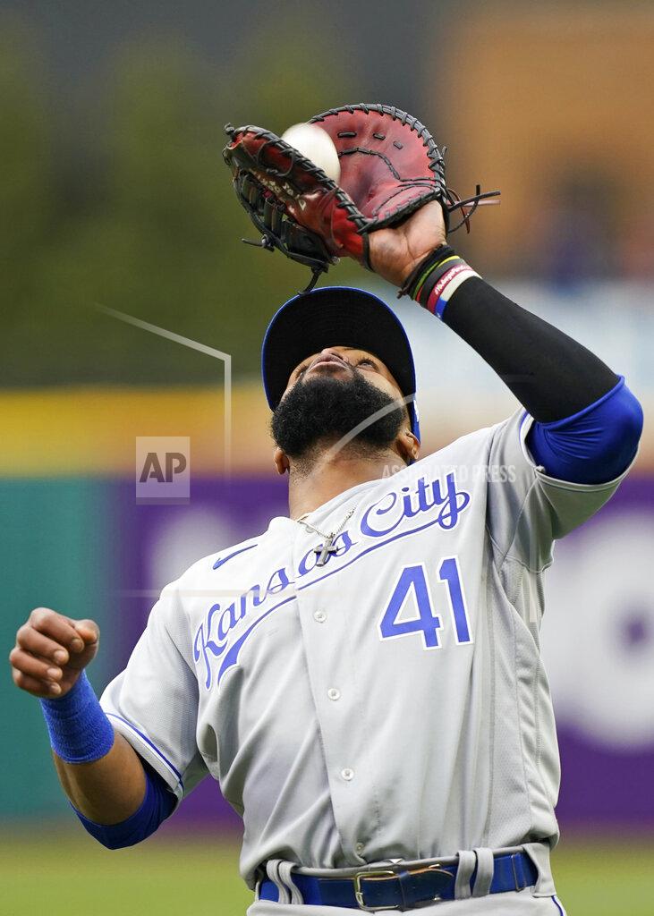 Tony Dejak Kansas City Royals' Carlos Santana catches a fly ball hit by Cleveland Indians' Yu Chang in the fifth inning of a baseball game, Monday, April 5, 2021, in Cleveland. Santana was out on the play. (AP Photo/Tony Dejak)