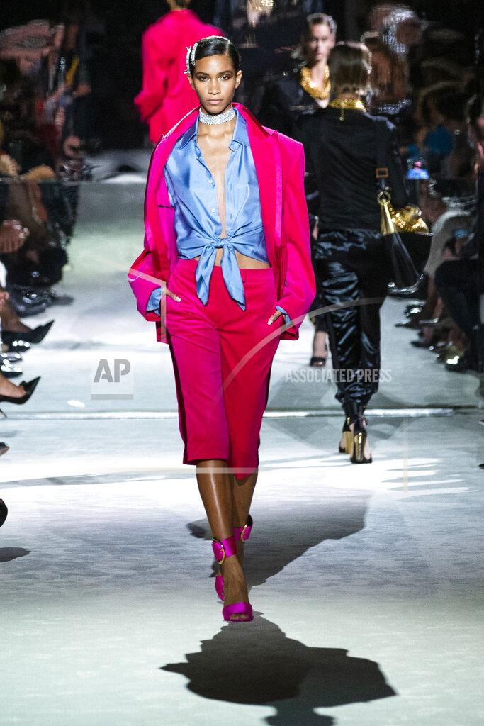 Eduardo Munoz Alvarez A model walks the runway at the Tom Ford spring/summer 2022 fashion show at Lincoln Center during New York Fashion Week on Sunday, Sept. 12, 2021. (AP Photo/Eduardo Munoz Alvarez)