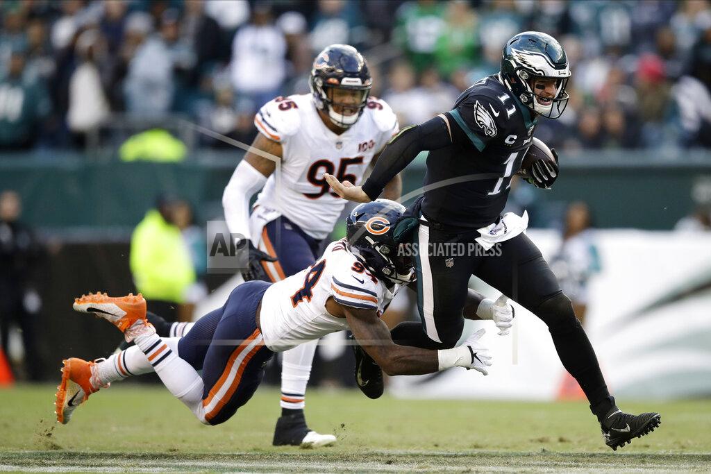 Matt Rourke Philadelphia Eagles' Carson Wentz, right, is tackled by Chicago Bears' Leonard Floyd during the second half of an NFL football game, Sunday, Nov. 3, 2019, in Philadelphia. (AP Photo/Matt Rourke)