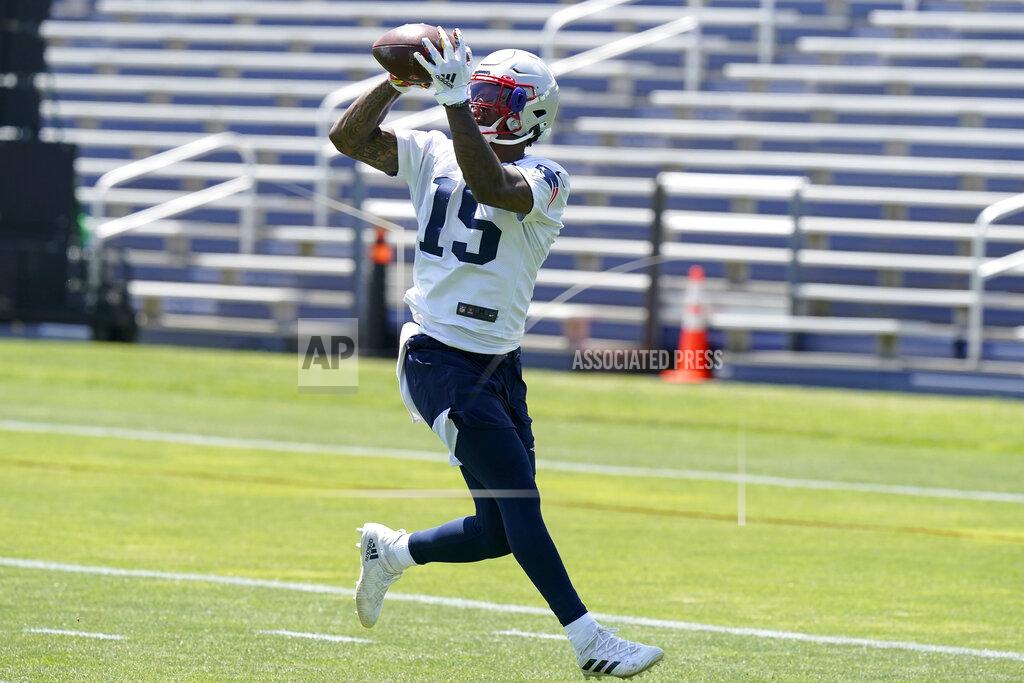 Steven Senne New England Patriots wide receiver N'Keal Harry (15) makes a catch during an NFL football practice in Foxborough, Mass., Thursday, May 27, 2021. (AP Photo/Steven Senne)
