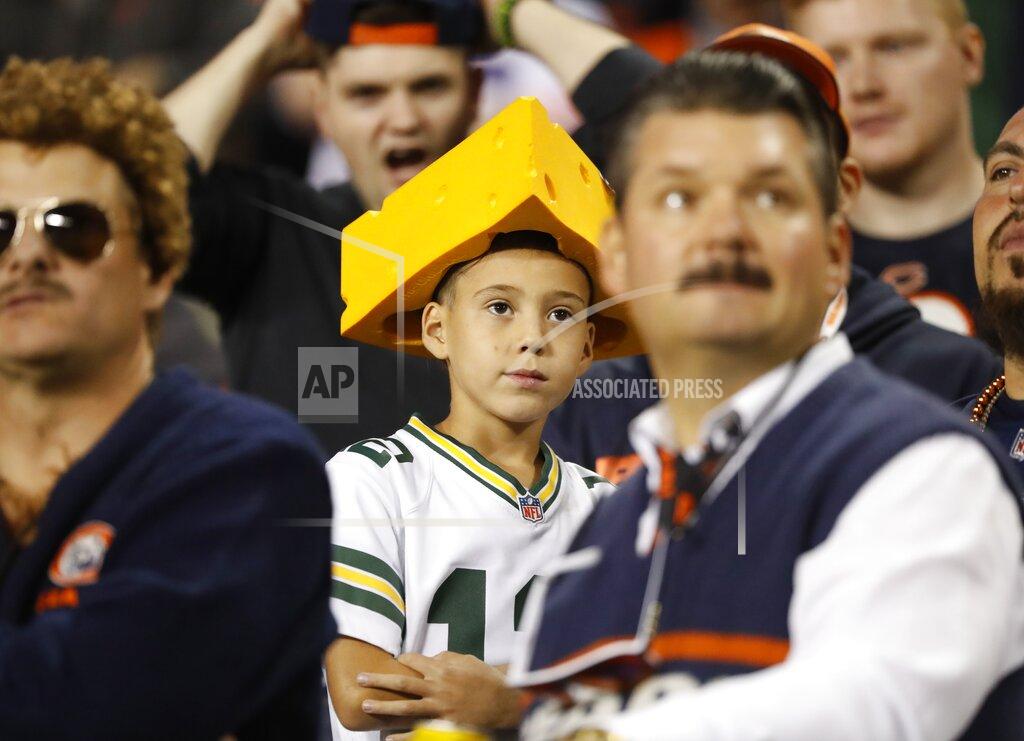 Charles Rex Arbogast A fan watches during the first half of an NFL football game between the Green Bay Packers and the Chicago Bears Thursday, Sept. 5, 2019, in Chicago. (AP Photo/Charles Rex Arbogast)