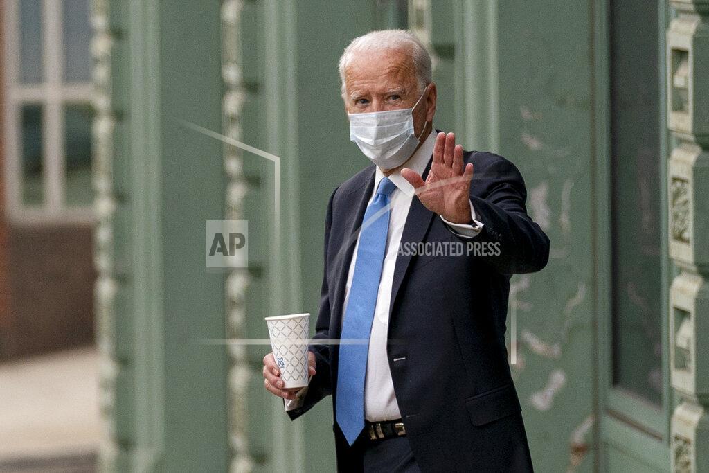 Democratic presidential candidate former Vice President Joe Biden departs the Queen Theater in Wilmington, Del., Thursday, Oct. 1, 2020, after pre-taping his speech for the Al Smith dinner. (AP Photo/Andrew Harnik)