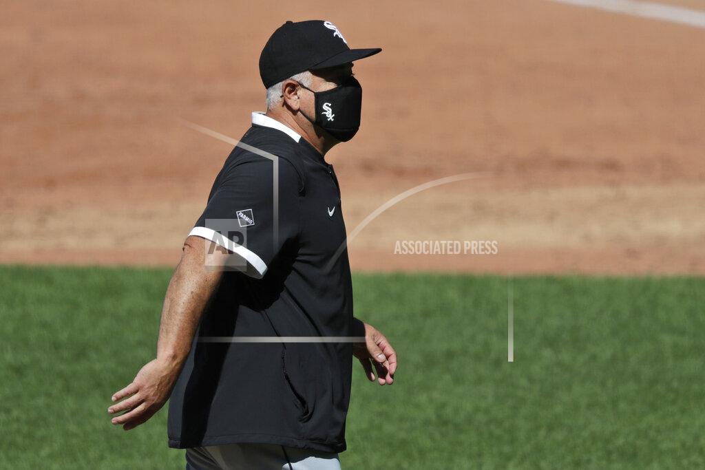 Tony Dejak Chicago White Sox manager Rick Renteria walks back to the dugout from the pitcher's mound in the third inning in the first baseball game of a doubleheader against the Cleveland Indians, Tuesday, July 28, 2020, in Cleveland. (AP Photo/Tony Dejak)