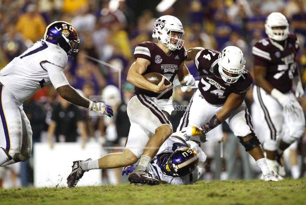 Tyler Kaufman Mississippi State quarterback Nick Fitzgerald (7) runs the ball past LSU defensive end Glen Logan (97) during an NCAA college football game in Baton Rouge, La., Saturday, Oct. 20, 2018. LSU won 19-3. (AP Photo/Tyler Kaufman)