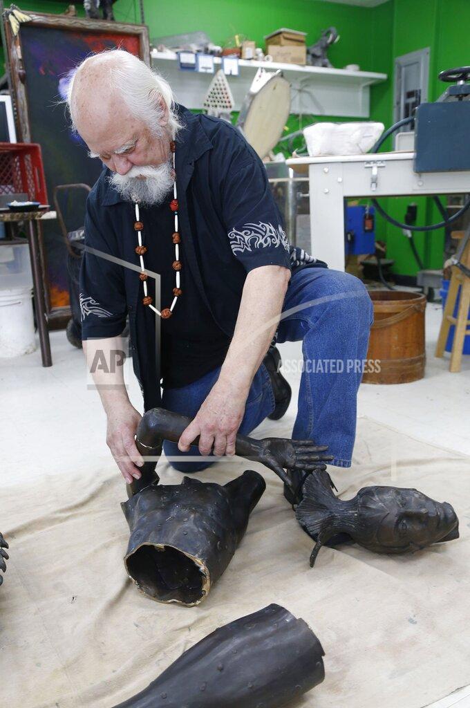 Stephen Pingry Sculptor Gary Henson, who made the Marjorie Tallchief statue that was stolen from the Tulsa Historical Society and cutup for scrap metal, shows the parts which he will reassemble at the Boys and Girls Club in Chelsea, Okla., on Monday, May 9, 2022. (Stephen Pingry/Tulsa World via AP)