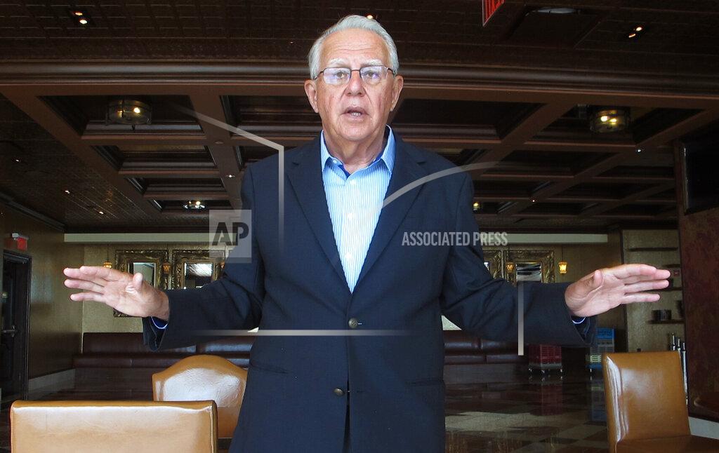 Wayne Parry Phil Juliano, a vice president with Bally's Corp. looks over a high-rollers lounge at Bally's casino in Atlantic City N.J. on Monday, June 14, 2021. The new owners of Bally's Atlantic City are attempting to revive a comatose casino in perhaps the most cutthroat gambling market in America. Rhode Island-based Bally's Corporation is spending at least $90 million on the Boardwalk casino over the next five years, including hotel room makeovers, a renovation of the casino floor, new slot machines and restaurants, and more live entertainment. (AP Photo/Wayne Parry)