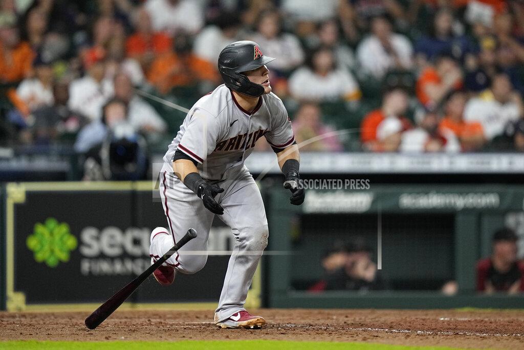 David J. Phillip Arizona Diamondbacks' Daulton Varsho drops his bat after hitting a two-run home run against the Houston Astros during the 10th inning of a baseball game Saturday, Sept. 18, 2021, in Houston. (AP Photo/David J. Phillip)