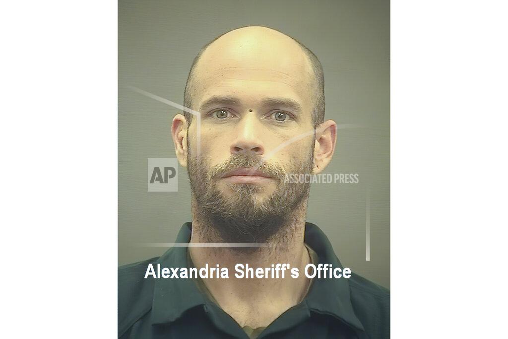 Uncredited FILE - This undated file image provided by The Alexandria (Va.) Sheriff's Office shows Jacob Chansley, who pleaded guilty on Friday, Sept. 3, 2021, to a felony obstruction charge for his part in the Capitol riot. Chansley is known for having stormed the Capitol while sporting face paint, no shirt and a furry hat with horns. He carried a flagpole topped with a spear into the insurrection, yelled into a bullhorn as officers tried to control the crowd and wrote a note to then-Vice President Mike Pence that prosecutors have said was threatening. (Alexandria Sheriff's Office via AP, File)