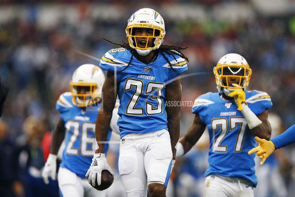 Eduardo Verdugo Los Angeles Chargers strong safety Rayshawn Jenkins, center, celebrates his interception with teammates during the first half of an NFL football game against the Kansas City Chiefs, Monday, Nov. 18, 2019, in Mexico City. (AP Photo/Eduardo Verdugo)