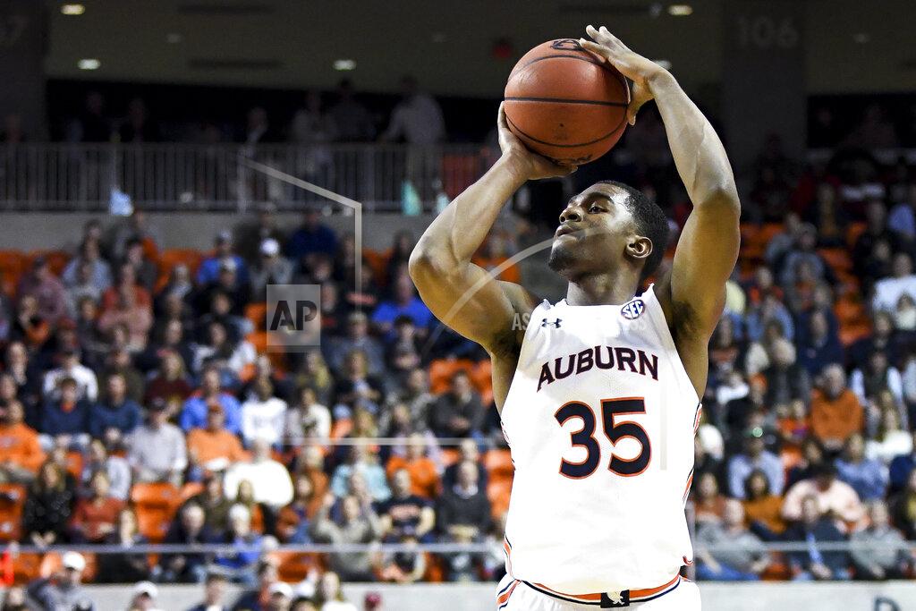 Julie Bennett Auburn guard Devan Cambridge (35) shoots for three points during the second half of an NCAA college basketball game against South Carolina Wednesday, Jan. 22, 2020, in Auburn, Ala. (AP Photo/Julie Bennett)