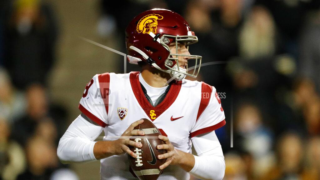 David Zalubowski Southern California quarterback Kedon Slovis (9) in the second half of an NCAA college football game Friday, Oct. 25, 2019, in Boulder, Colo. Southern California won 35-31. (AP Photo/David Zalubowski)