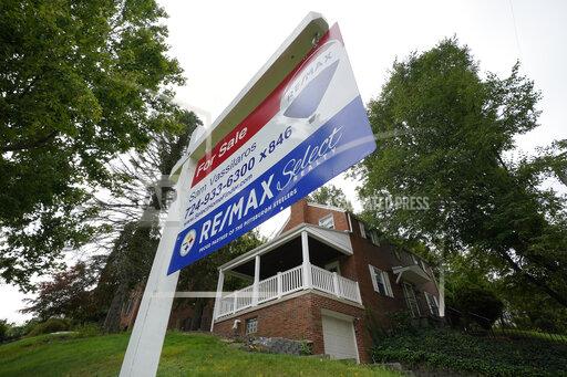 This is a home for sale in Mount Lebanon, Pa., on Tuesday, Sept. 21, 2021. Homebuilders and other real estate companies are increasingly betting that would-be homebuyers frustrated with a shortage of homes for sale and runaway prices will settle for renting their slice of the American Dream. While individual homeowners and mom-and-pop investors still account for the vast majority of single-family rental homes, homebuilders have stepped up construction this year of new houses being built for rent.(AP Photo/Gene J. Puskar)